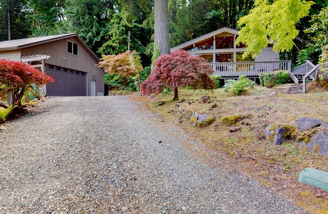 Bay-view home near beach with 2 firepits, grill, deck, streaming, wood fireplace