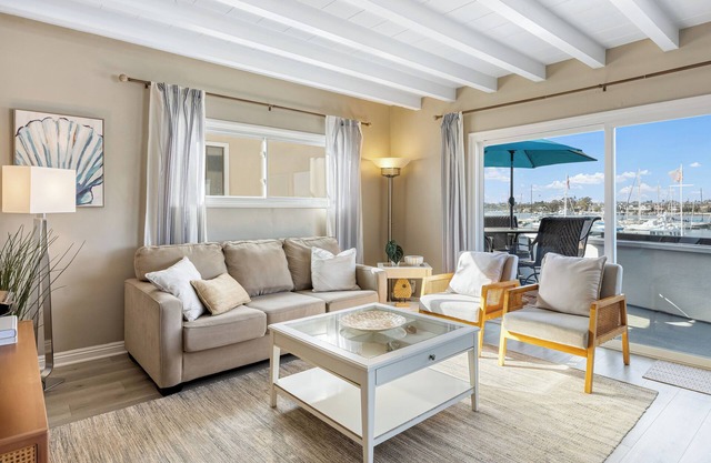 Bayfront Condo w/Dock Access + Patio | Walk to Beach, Surf & Newport Dining