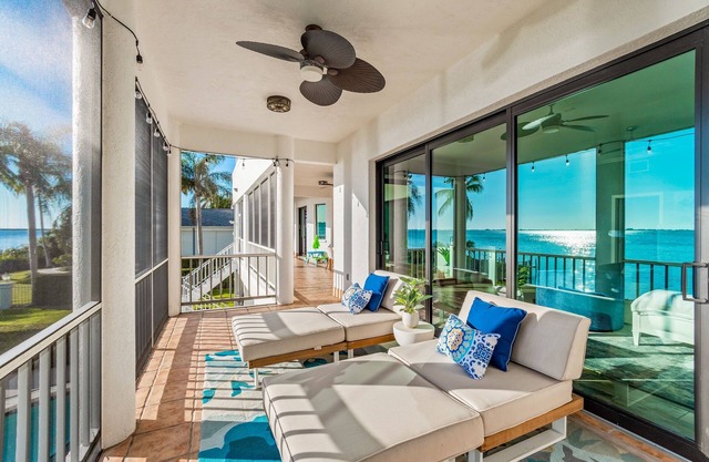 Bayfront estate with heated pool, private beach, dock & incredible sunsets