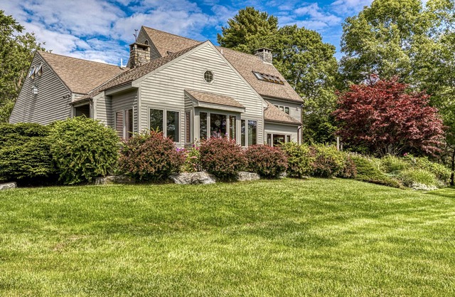 Bayfront home boasting gorgeous water views! Outdoor firepit and dock!