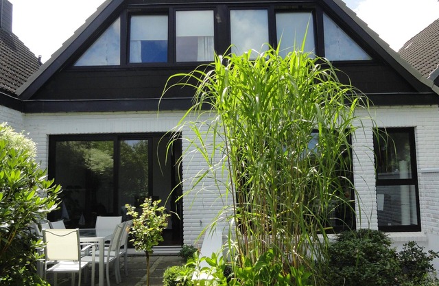 Beach and sea(h)r in a vacation home with garden close to the beach at Schilksee⛵️