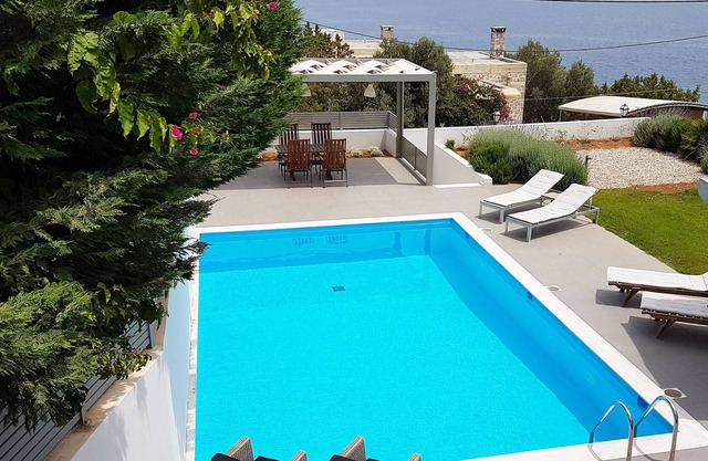 Beach front villa with private sea water pool & amazing sea view to Saronic golf