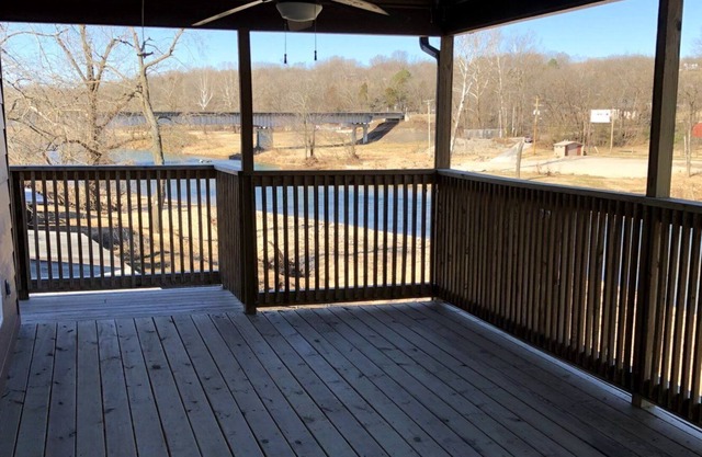 Beach house-style cabin on the Elk River in Pineville, Missouri