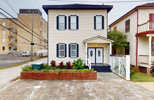 Beach townhome with private patio, dog-friendly & great location