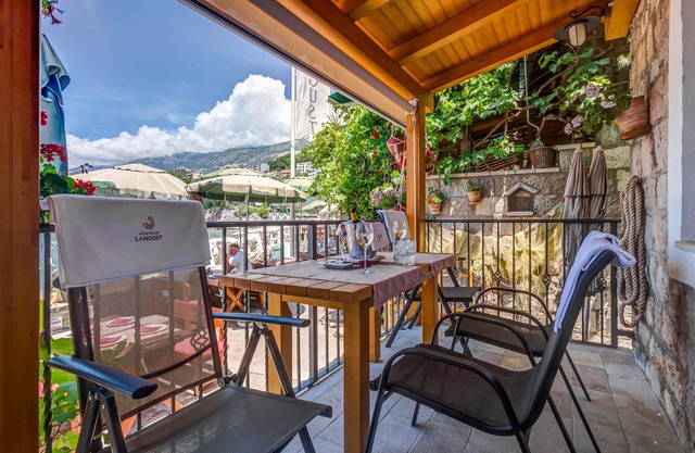 Beachfront 2BR Apartment with Terrace & Sea View