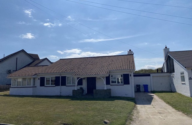 Beadnell Fantastic Bungalow - garden backs straight onto dunes and beach.