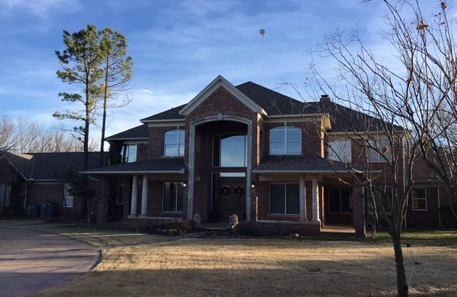Beautiful 10 acre wooded estate with 4 bedrooms, 4 1/2 baths & private pool.