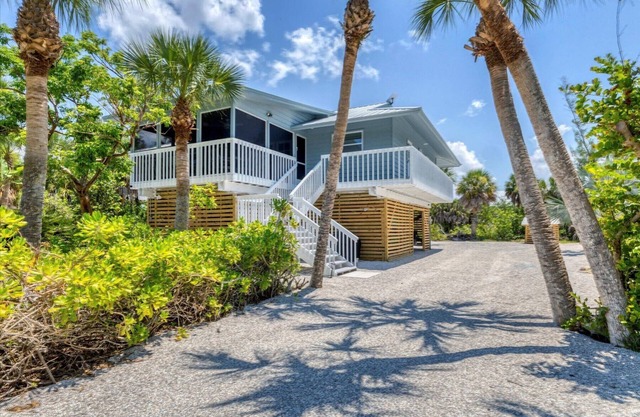 Beautiful 4-bedroom beach home with dock on private island.