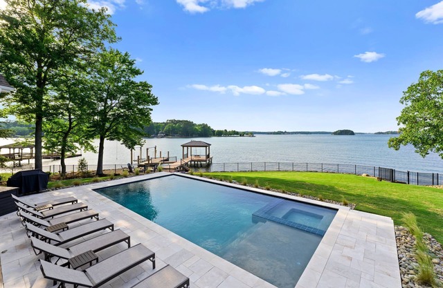 Beautiful 5 Bedroom Lake-Front Home with Heated Saltwater Pool, Spa, and Dock