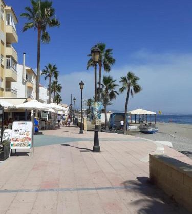 Beautiful Beachfront Newly Renovated 2 Bedroom Apartment with Swimming Pool and Garden