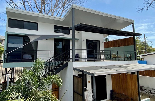 Beautiful modern condo, steps from the beach