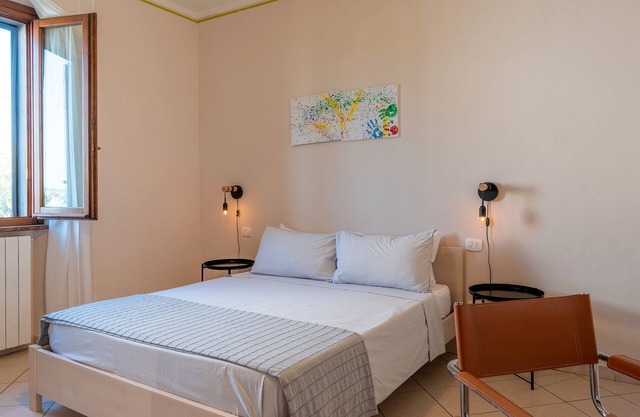 Bed and Breakfast 'Camera 5' with Shared Terrace, Wi-Fi and Air Conditioning