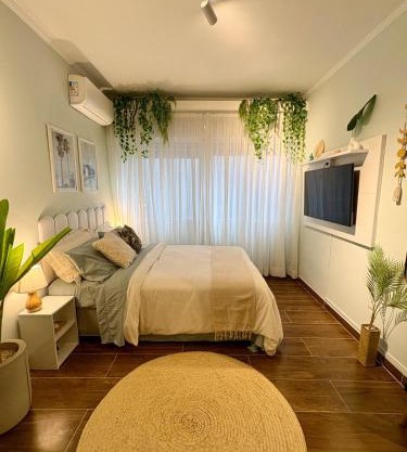 Beira-mar - Apt aconchegante com ar e Wi-Fi