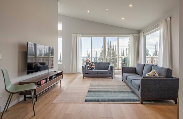 Brand new 3 level duplex with sweeping views, hot tub, laundry, office & garage