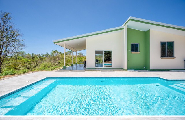 Brand-new home in lush setting with private pool & washer/dryer - near beach