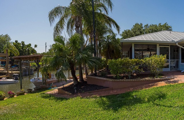 Breezy canal front home directly off the Indian River