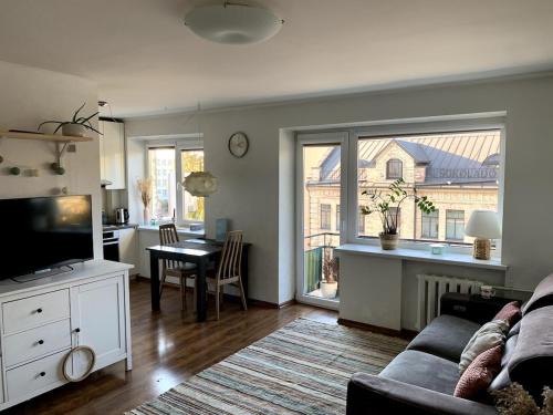 Bright and cozy apartment in the city center with balcony