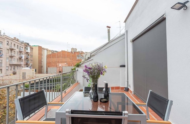 Bright and cozy attic apartment with two private terraces for 4
