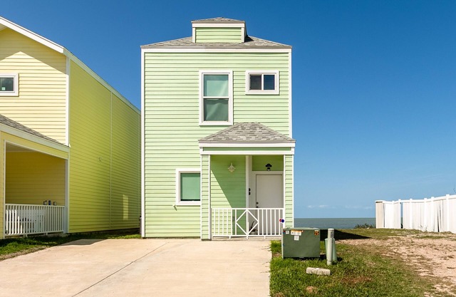 Bright Waterfront Home with Shared Pool, Water View, and High-Speed WiFi