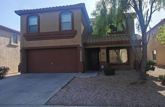 Browny 4 bedrooms 2.5 bath home near freeway.