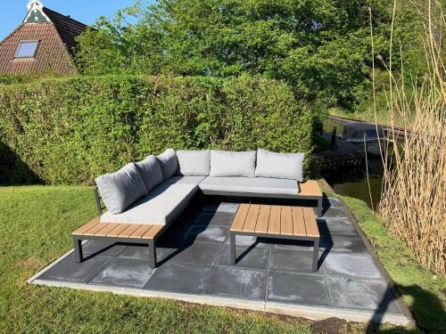 Bungalow in Friesland with Private Spa & Sloop, cleaning included