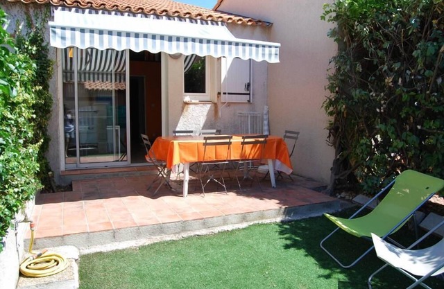 By the sea, house with garden