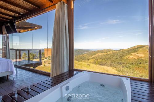 Cabana rústica com jacuzzi e vista incrível VST003