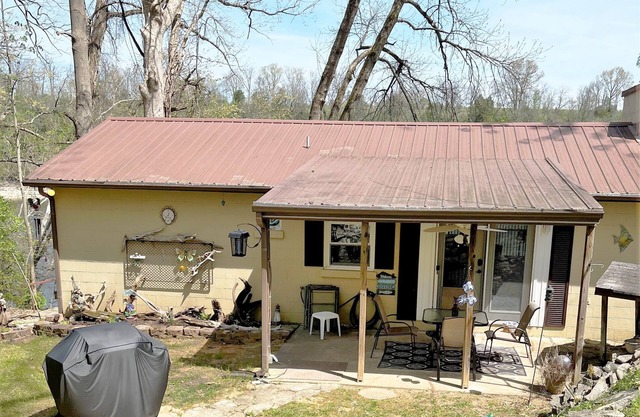Cabin located on lakeside with accessible boat dock.
