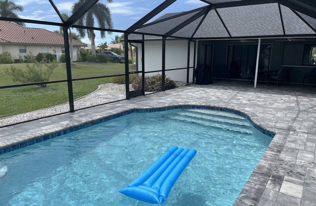 Canal-front home with private pool, grill, patio, AC, W/D & gorgeous views