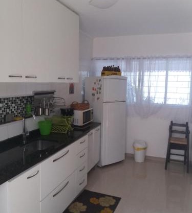 Casa com garagem em condomínio