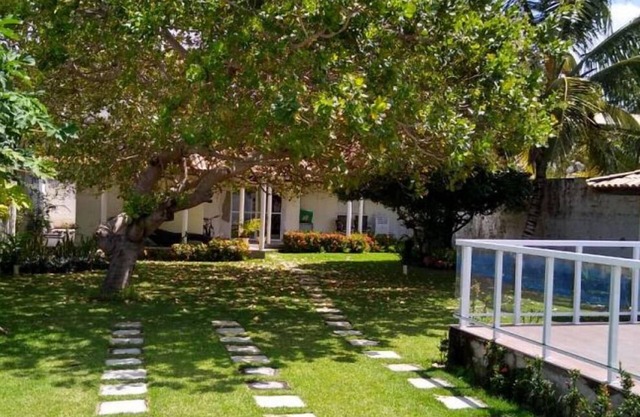 Casa de Praia Arborizada e Ventilada no Condomínio Entre o Encontro do rio e mar
