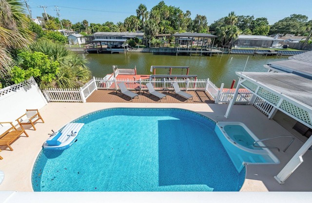 Casa Las Olas - Waterfront Home with Heated Pool, Movie Theater & Arcade