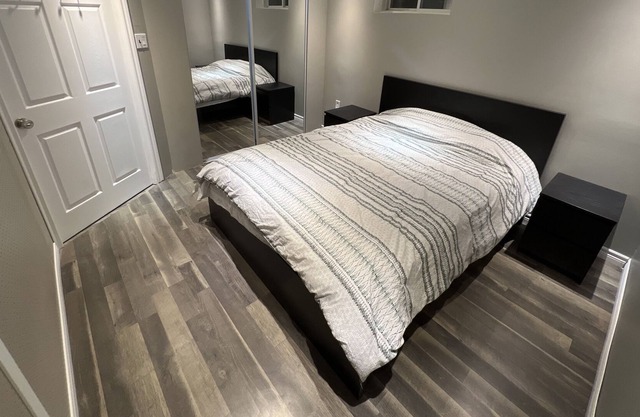 Central modern basement apartment close to lakes & skiing