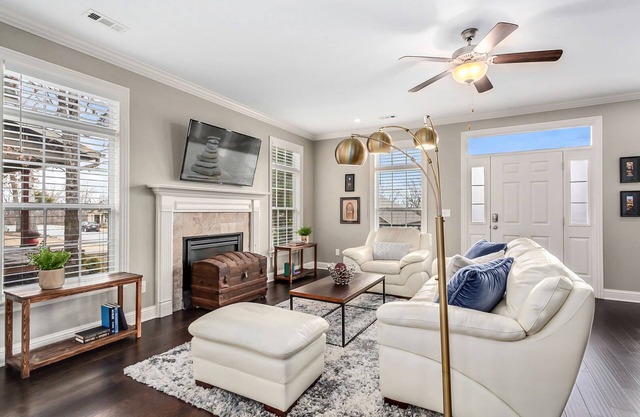 Centrally located home with large back porch, fireplace, washer/dryer, AC