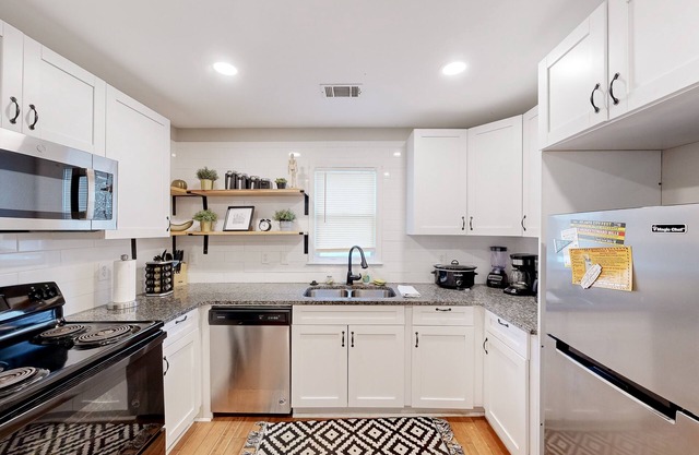 Centrally located West End home with 2 apts, AC, & W/D - dog-friendly