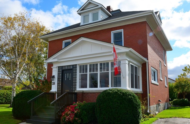 Century old 4 bedroom red brick home located in the Prettiest Town in Canada