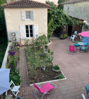 Chambre améliorée dans petite maisonnette, Au moulin du bonheur