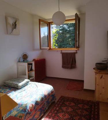 Chambre ensoleillée au calme