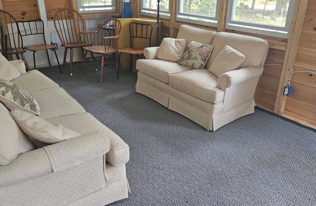 Charming 3-bedroom cabin in Casco with Sebago Lake access and a dock.