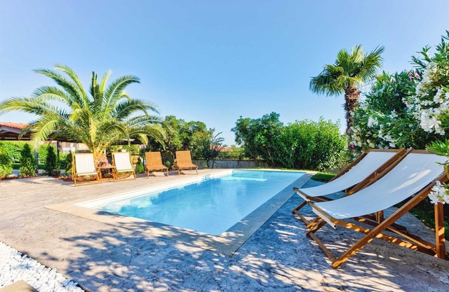 Charming 3 bedroom villa with pool surrounded by greenery