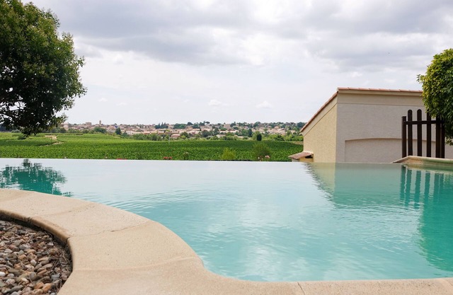 Charming air-conditioned house on estate with heated swimming pool