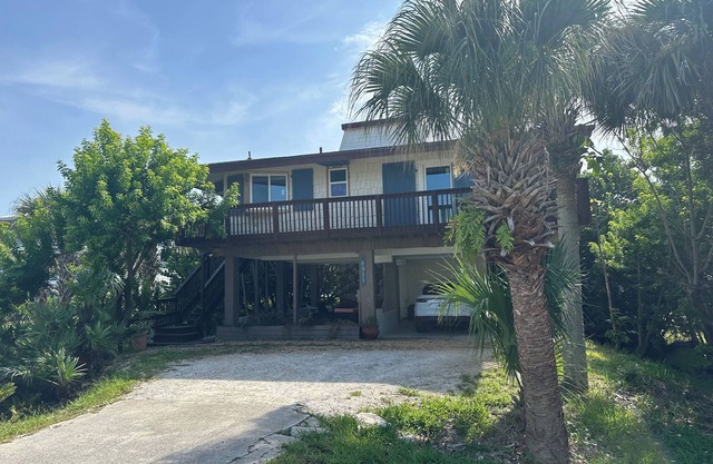 Charming beachside bungalow steps from the beach.