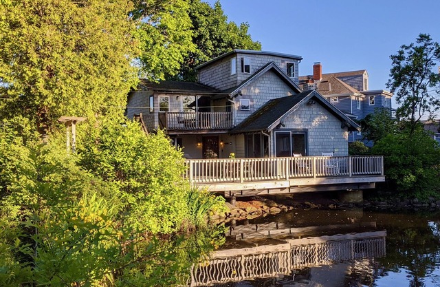 Charming, beloved house sleeps 8, with huge deck over pond & close to the ocean