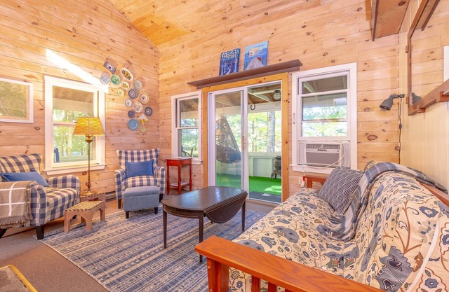 Charming Camp with an upstairs loft and wrap around deck. Near the Lake!