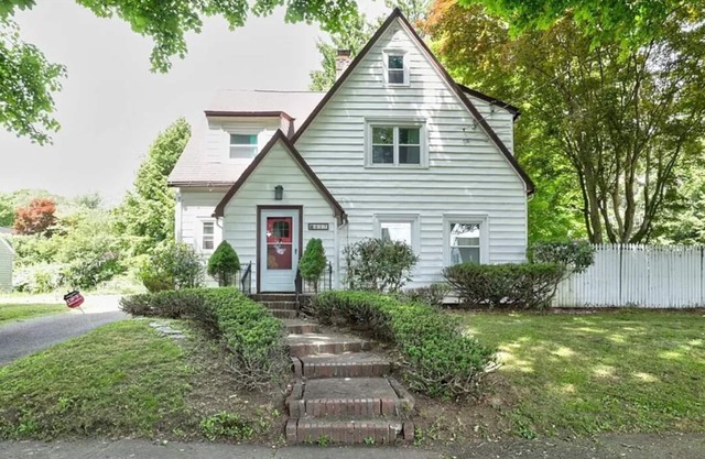 Charming Cottage w/Fireplace, Fenced Yard & Basement Game Room!