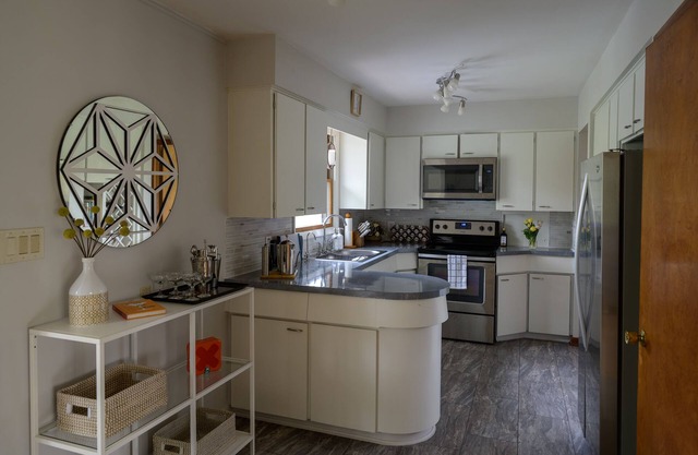 Charming home on 5 acres of forest with 2 patios, minutes away from town/beach