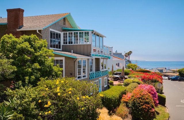 Classic beach town vibe on iconic Cliff Dr, steps to stunning Heisler Pk.