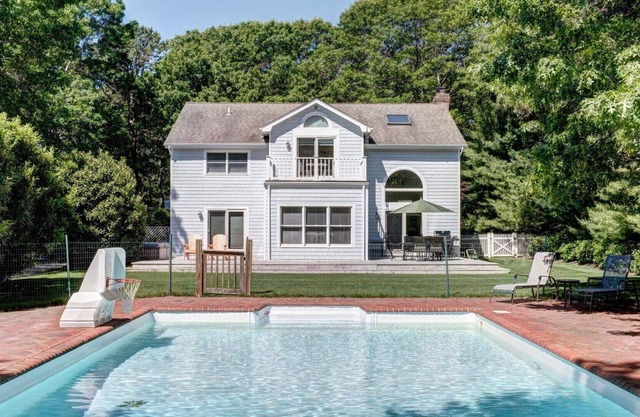 Classic Summer home with heated pool, hot tub, deck, outdoor seating,...