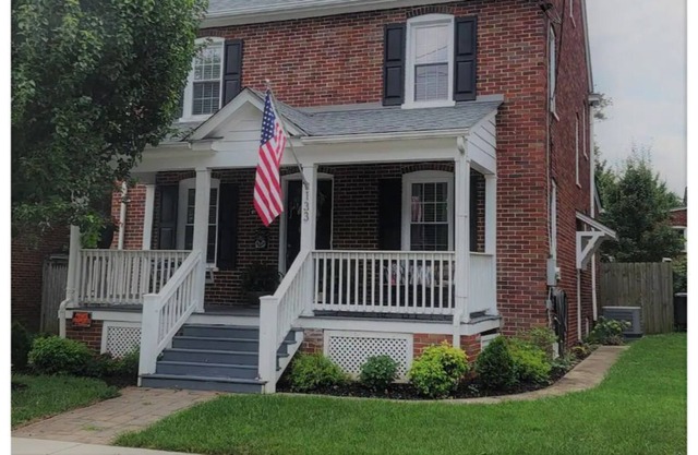 Classic Updated 3 BR brick home w/ bright sunroom