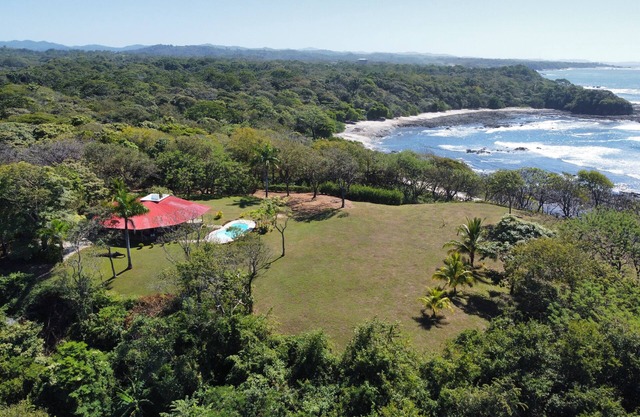 Cliff side Costa Rican home with private pool surrounded by wildlife
